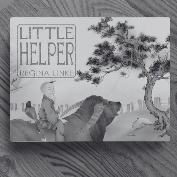 Black and white version of the book cover for Little Helper by Regina Linke featuring a boy riding an ox with a bird and a kite in the background